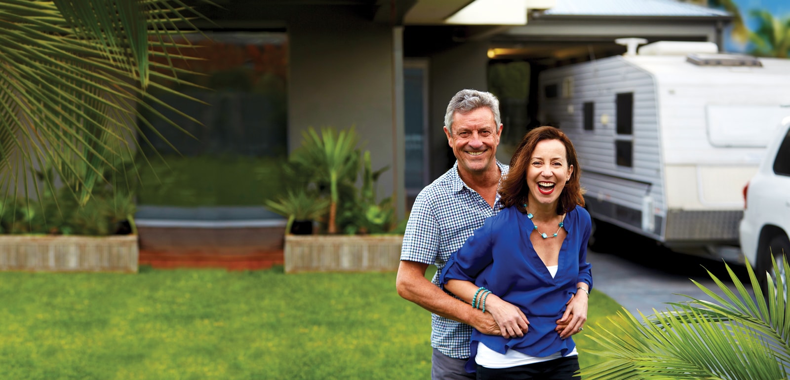 Life At Latitude25 LR WEB LAT25 Lifestyle Hero 01 House RV Couple 662 OPT V1 - Life At Latitude25