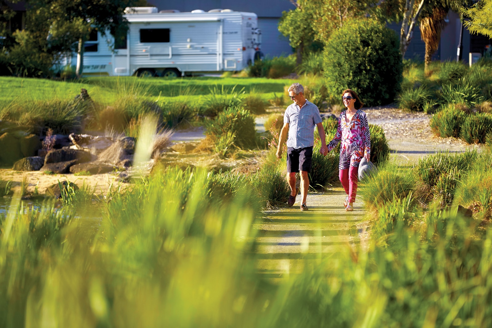 Why Hervey Bay? LR WEB LAT25 Lifestyle Lake Walk Couple 02 475 OPT V1 - Why Hervey Bay?